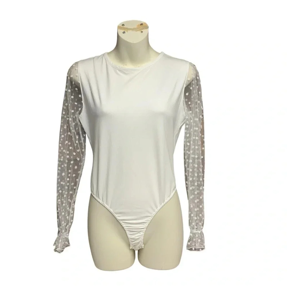 Alredine white body suit size medium polka dotted sheer sleeves 2 snap closure